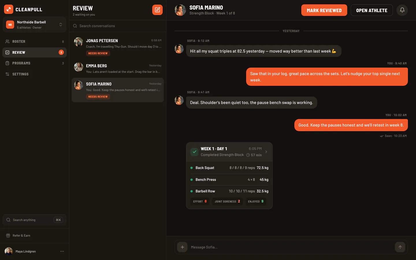 Cleanpull web app: the review queue with two workouts waiting, and Sofia Marino's conversation open — her completed workout with reps, loads, and check-in scores above the messages